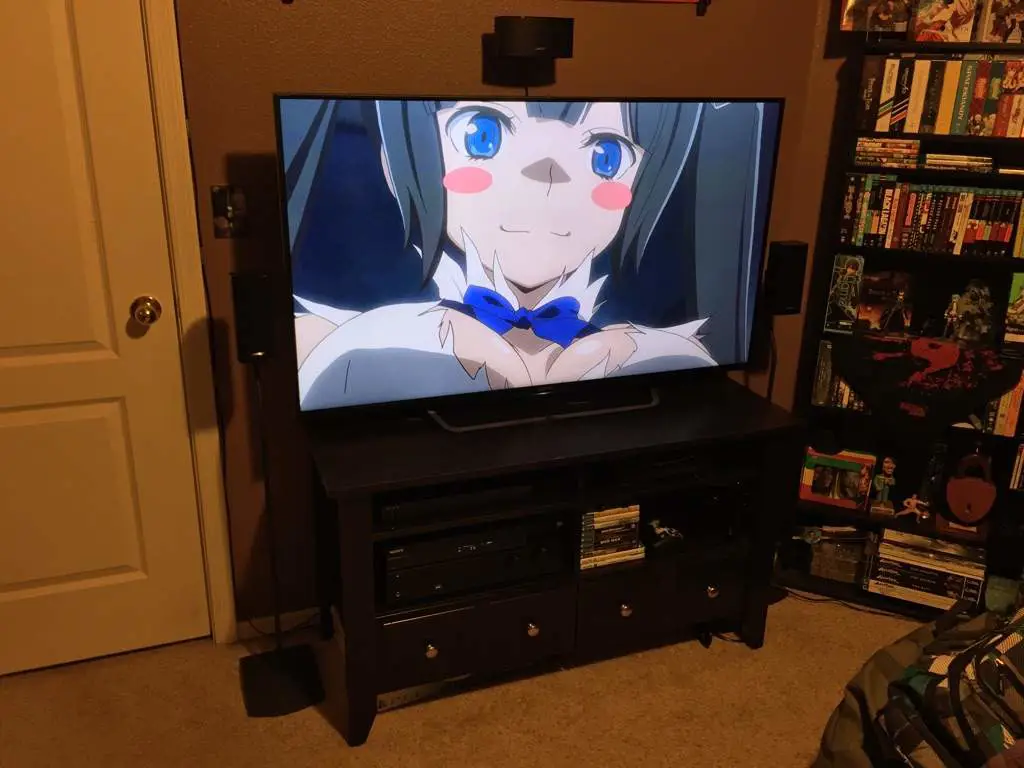 Suasana Menonton Anime yang Nyaman Gambar pengaturan menonton anime yang nyaman, dengan lampu dan snack